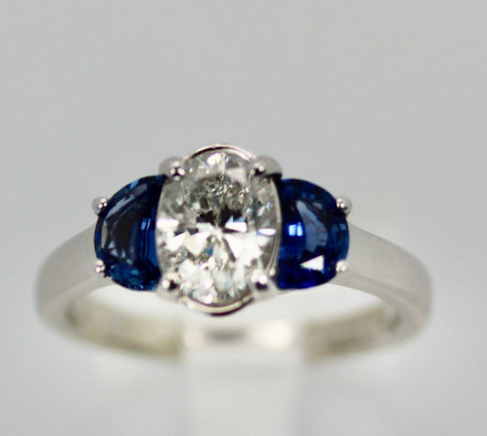 Elegant diamond ring with sapphires