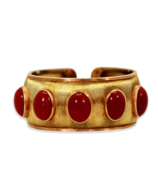 Gold bracelet with red stones