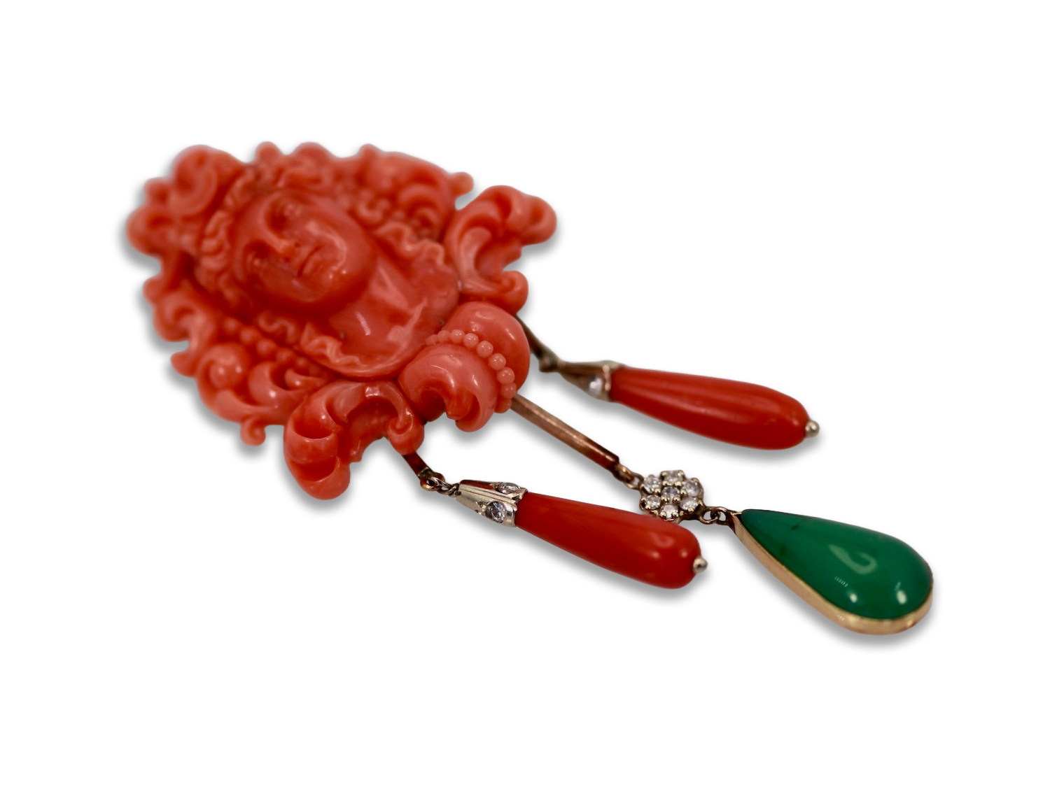 Coral drop brooch with green stone