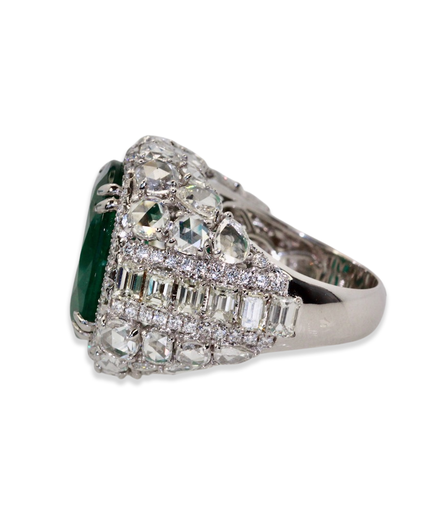 Diamond surround emerald ring

