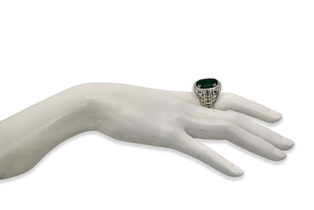 Diamond surround emerald ring

