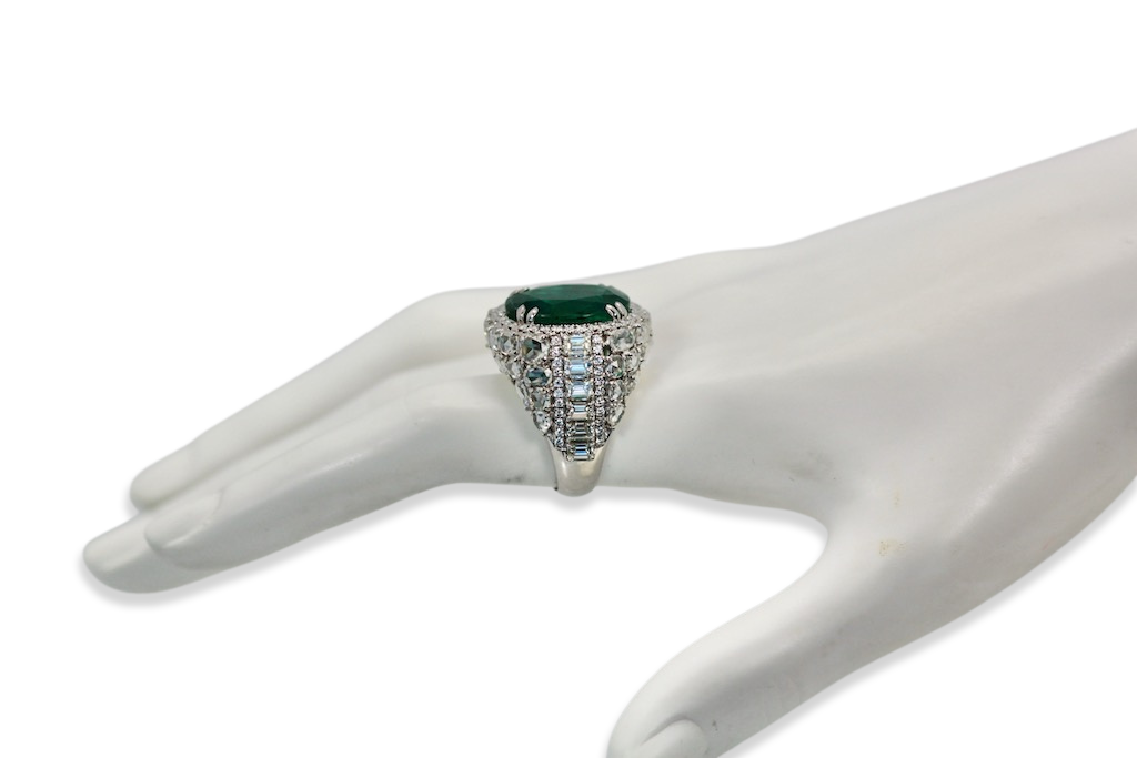 Diamond surround emerald ring

