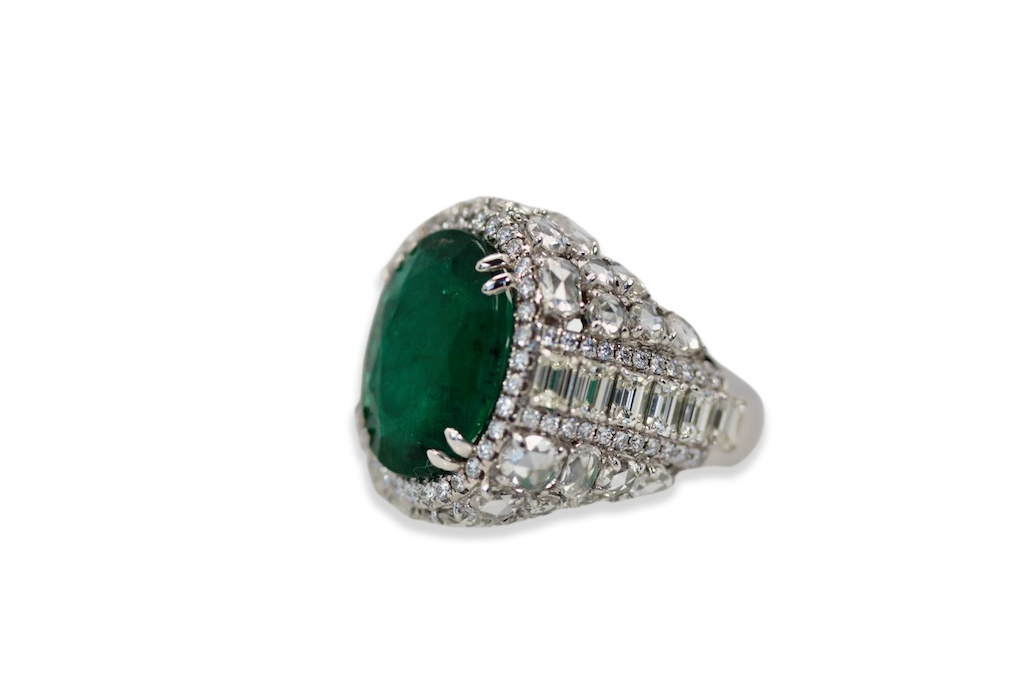 Emerald ring, diamond halo