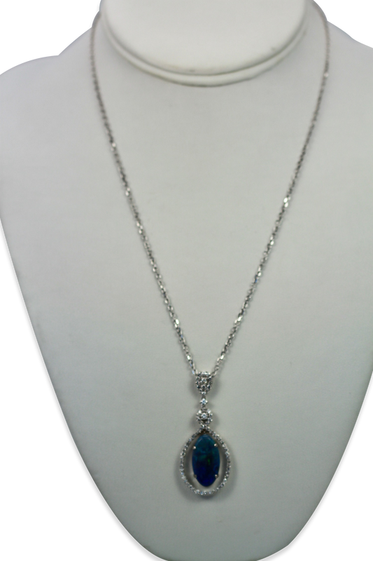 Crystal opal with diamond surround