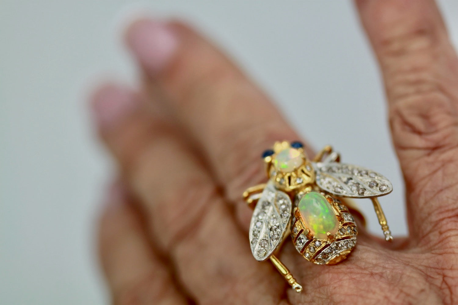 Articulated insect ring, opal