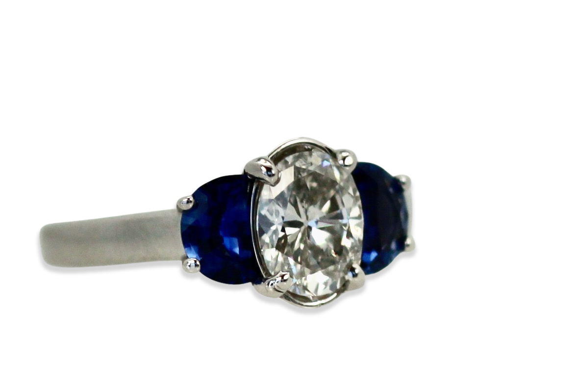 Diamond ring with sapphire accents