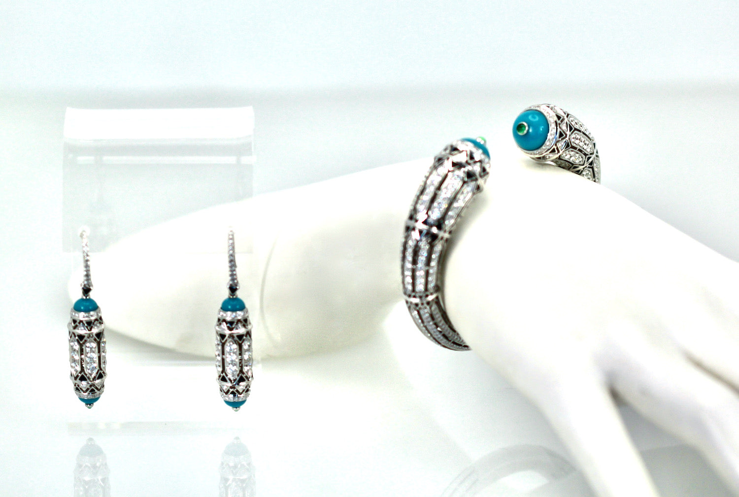 Black enamel Cartier bracelet with turquoise and emeralds