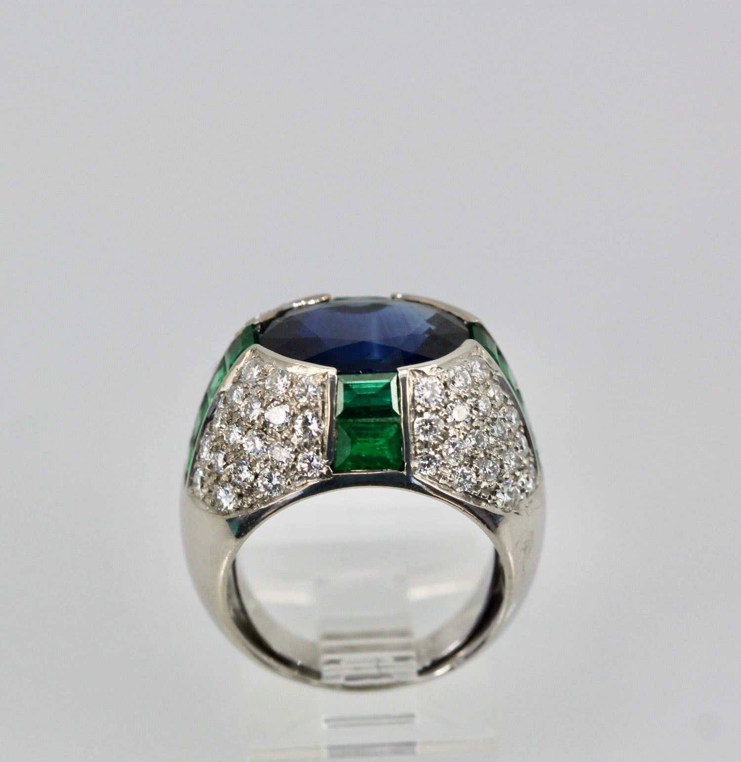 Ring with blue and green gemstones