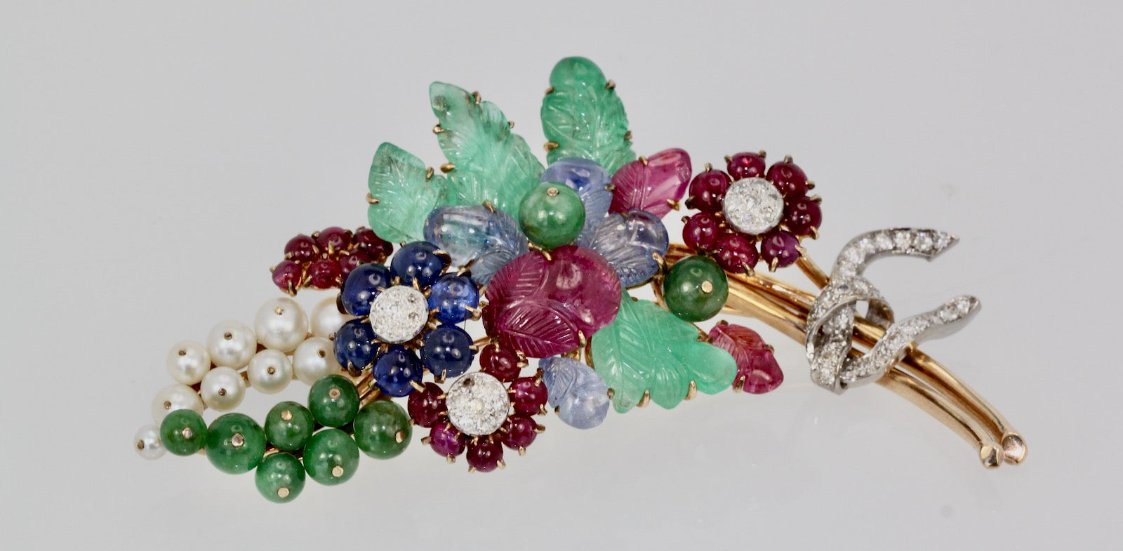 Gem-set brooch with certificate