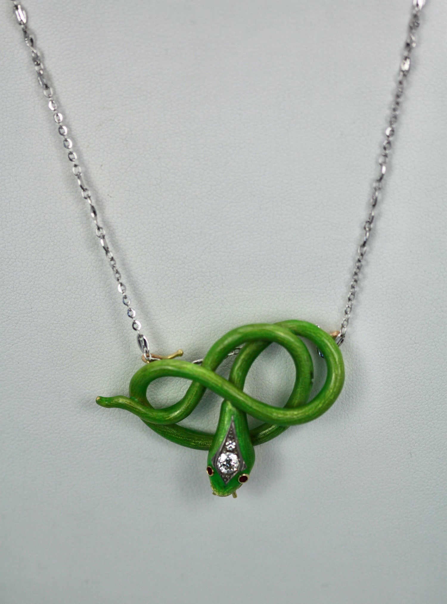 Green enamel snake charm