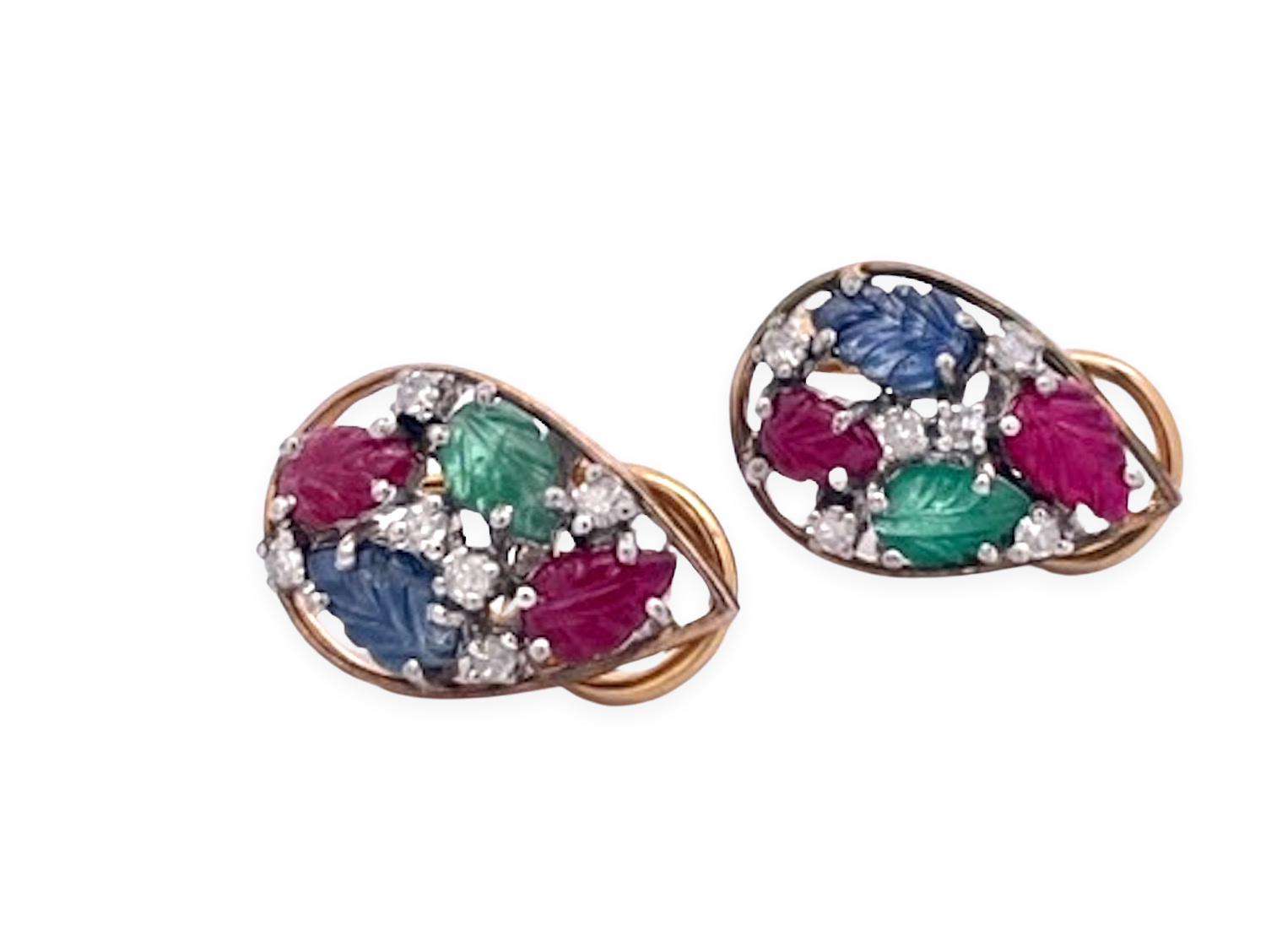 Colorful carved gemstone set with diamonds