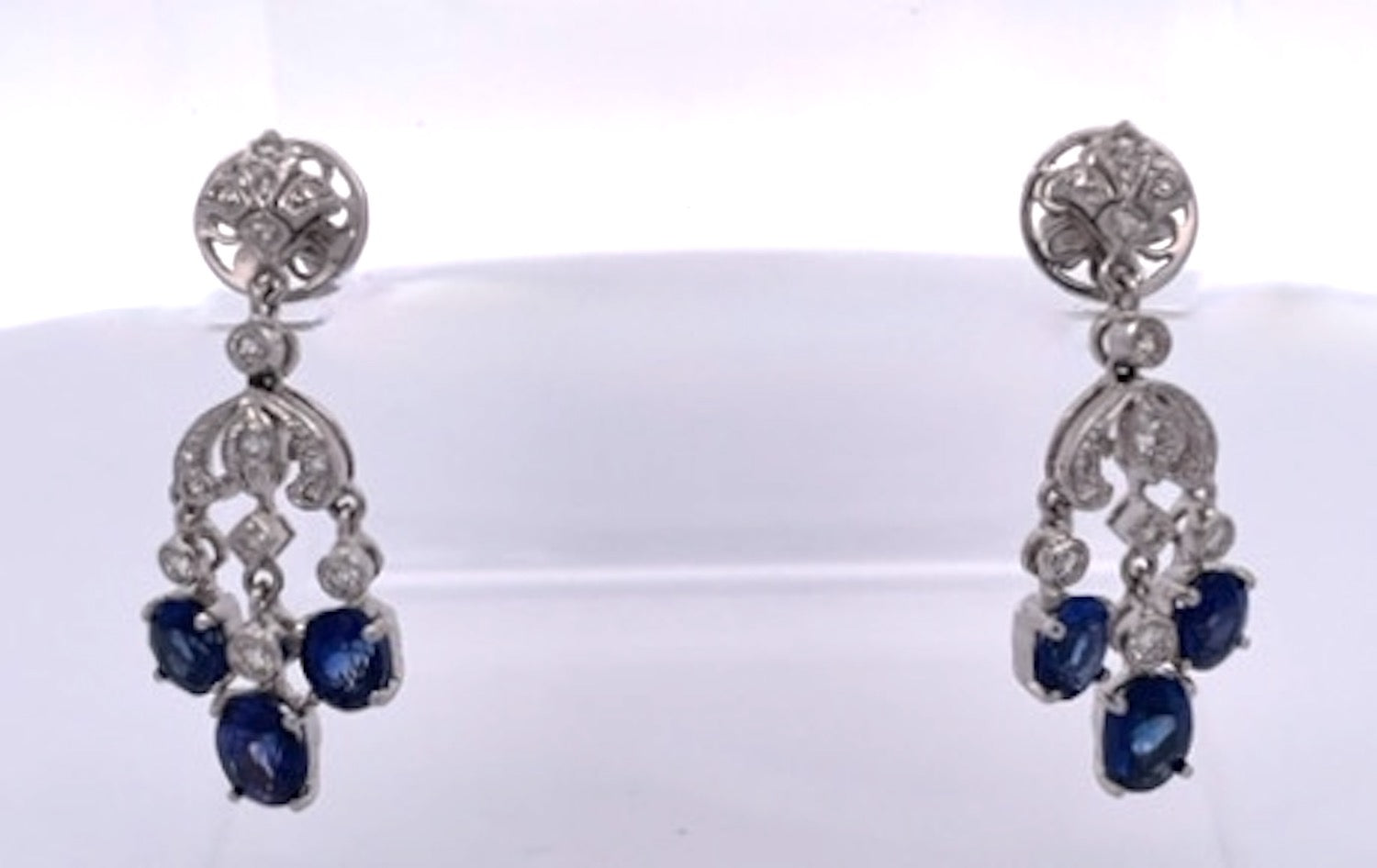 Fleur de lis sapphire earrings with diamonds