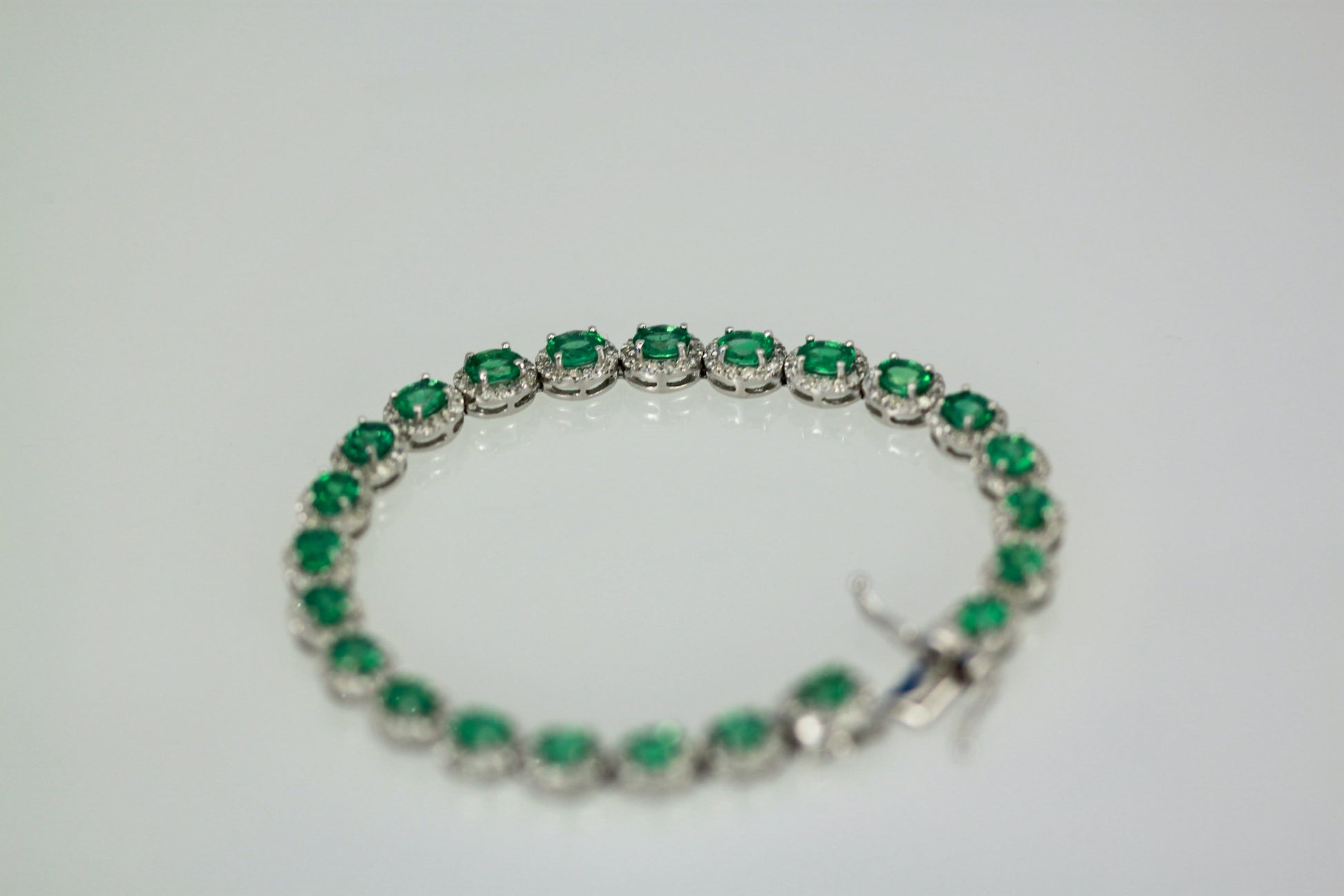 Platinum link bracelet with gems