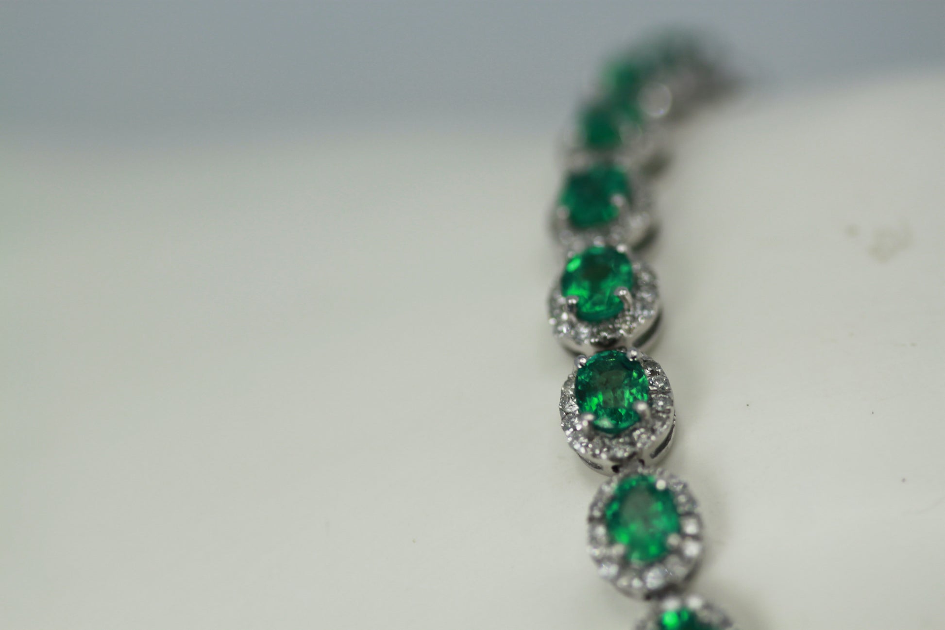 Emerald and diamond link bracelet