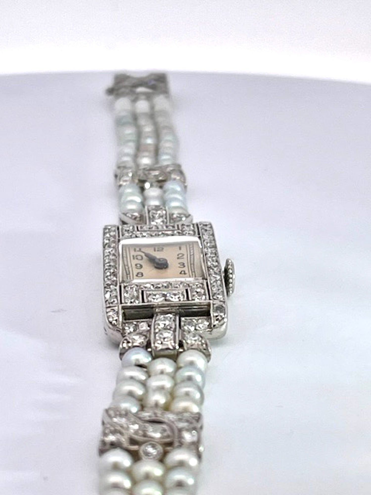 Vintage pearl and diamond watch