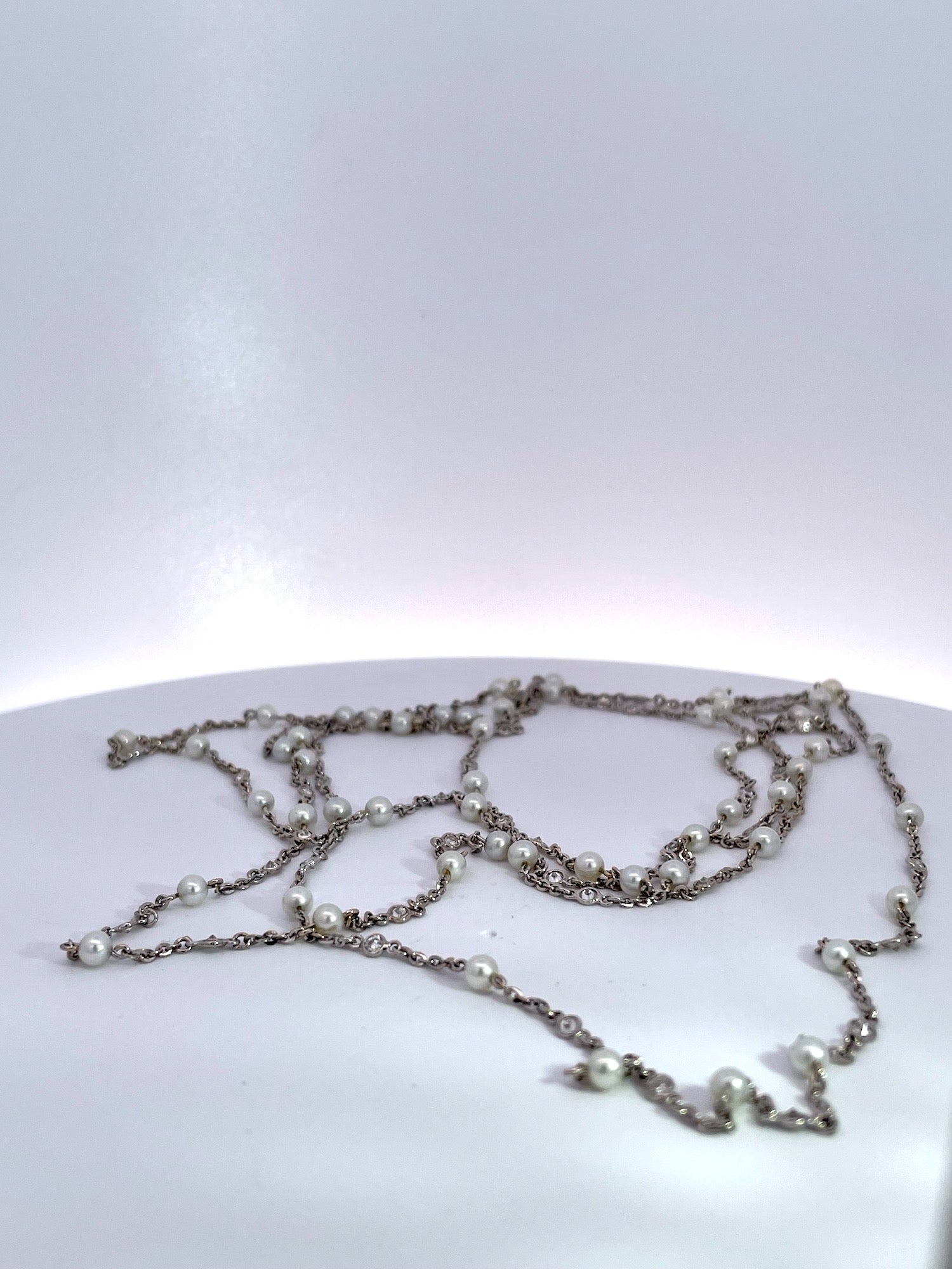 Platinum necklace with seed pearls