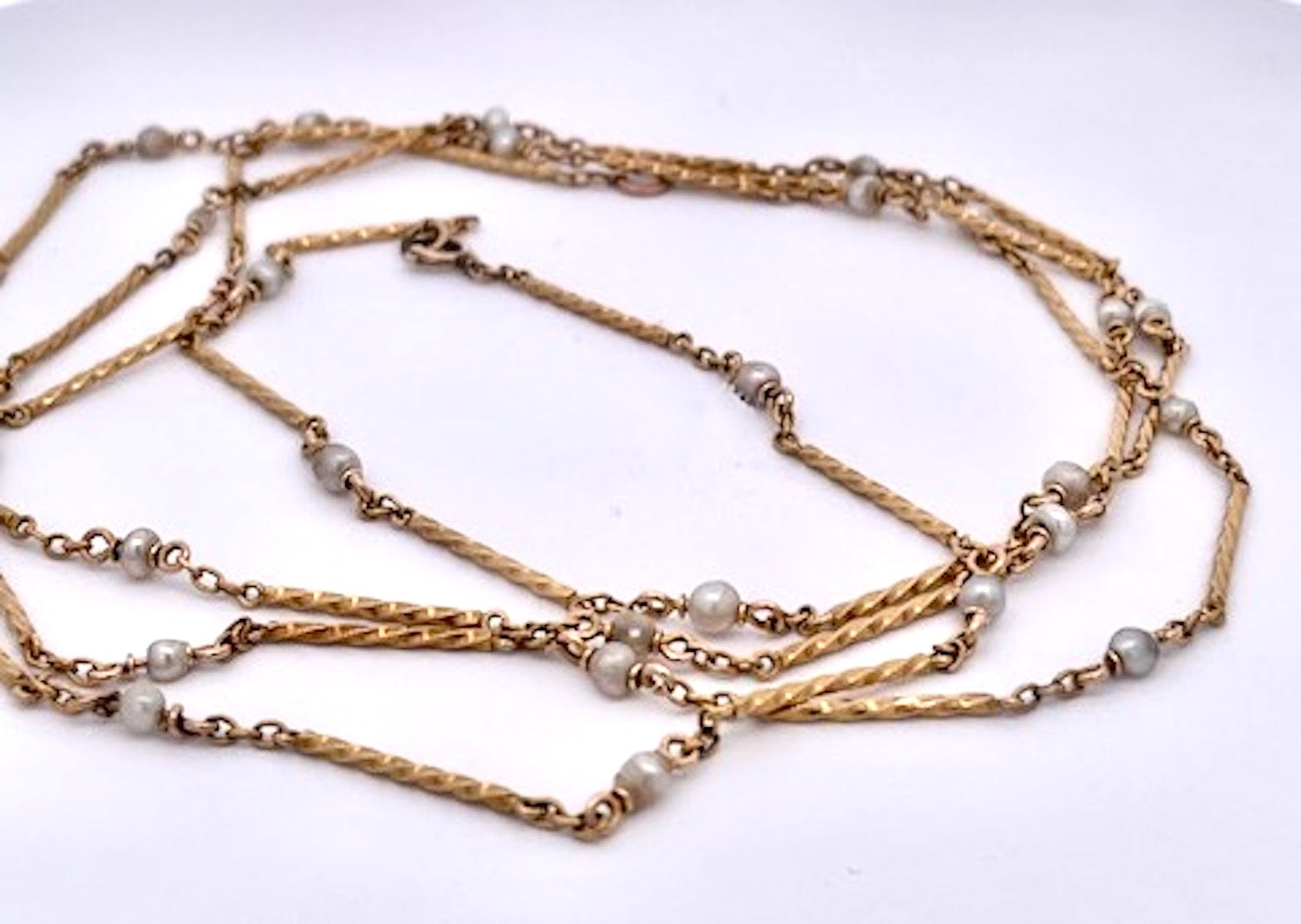 Gold chain necklace with small pearls 