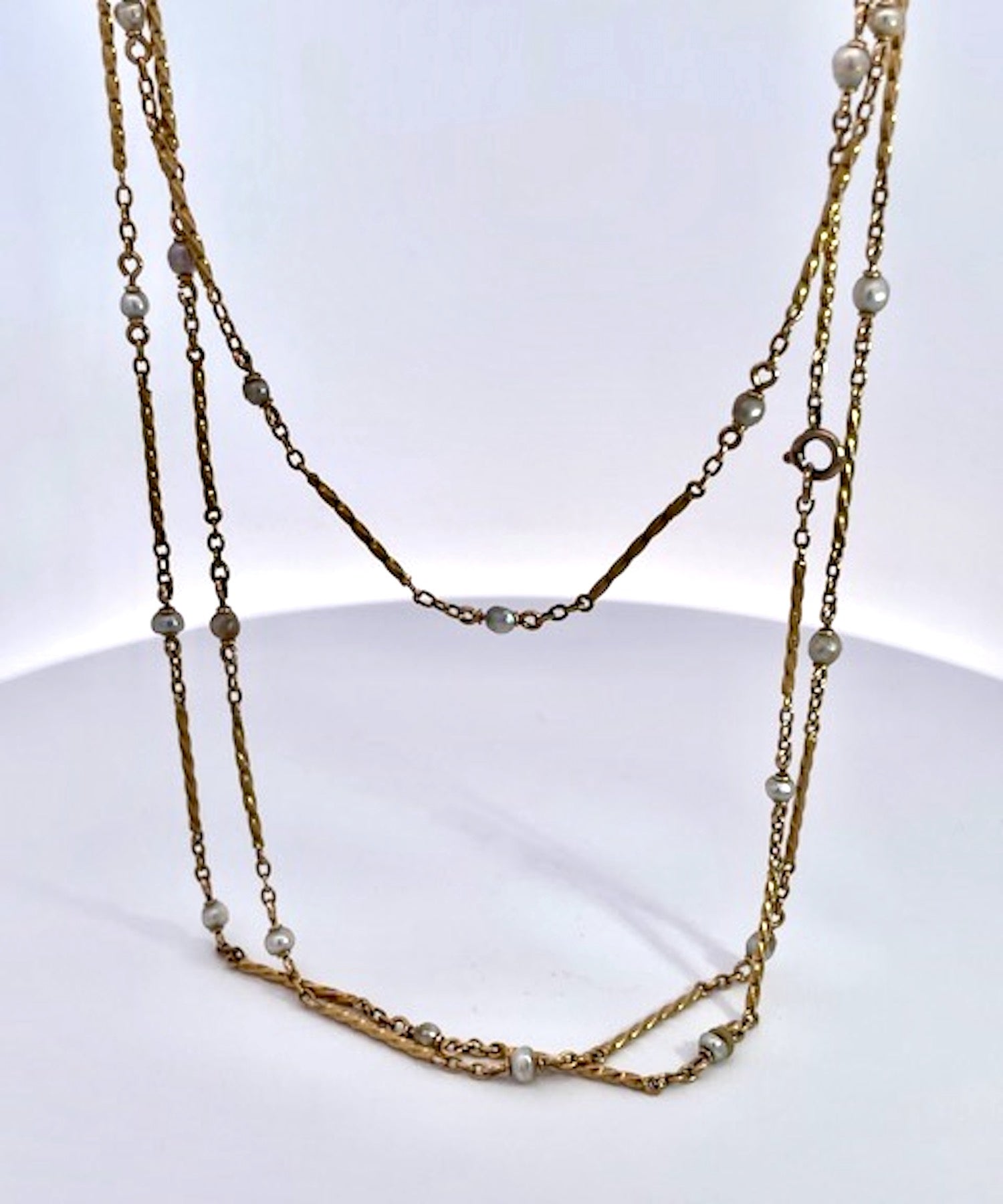 Gold chain necklace with small pearls 