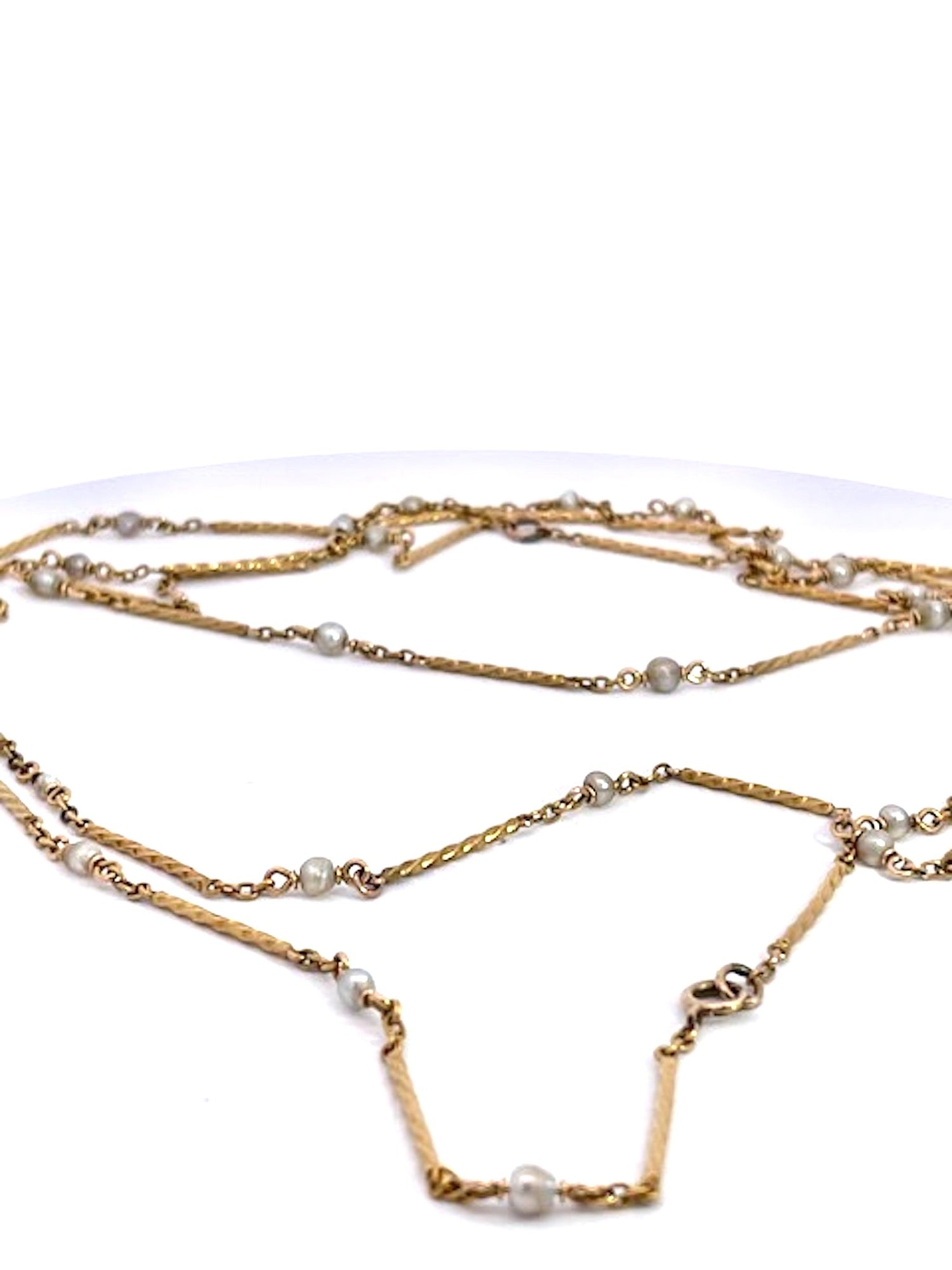 Gold chain necklace with small pearls 