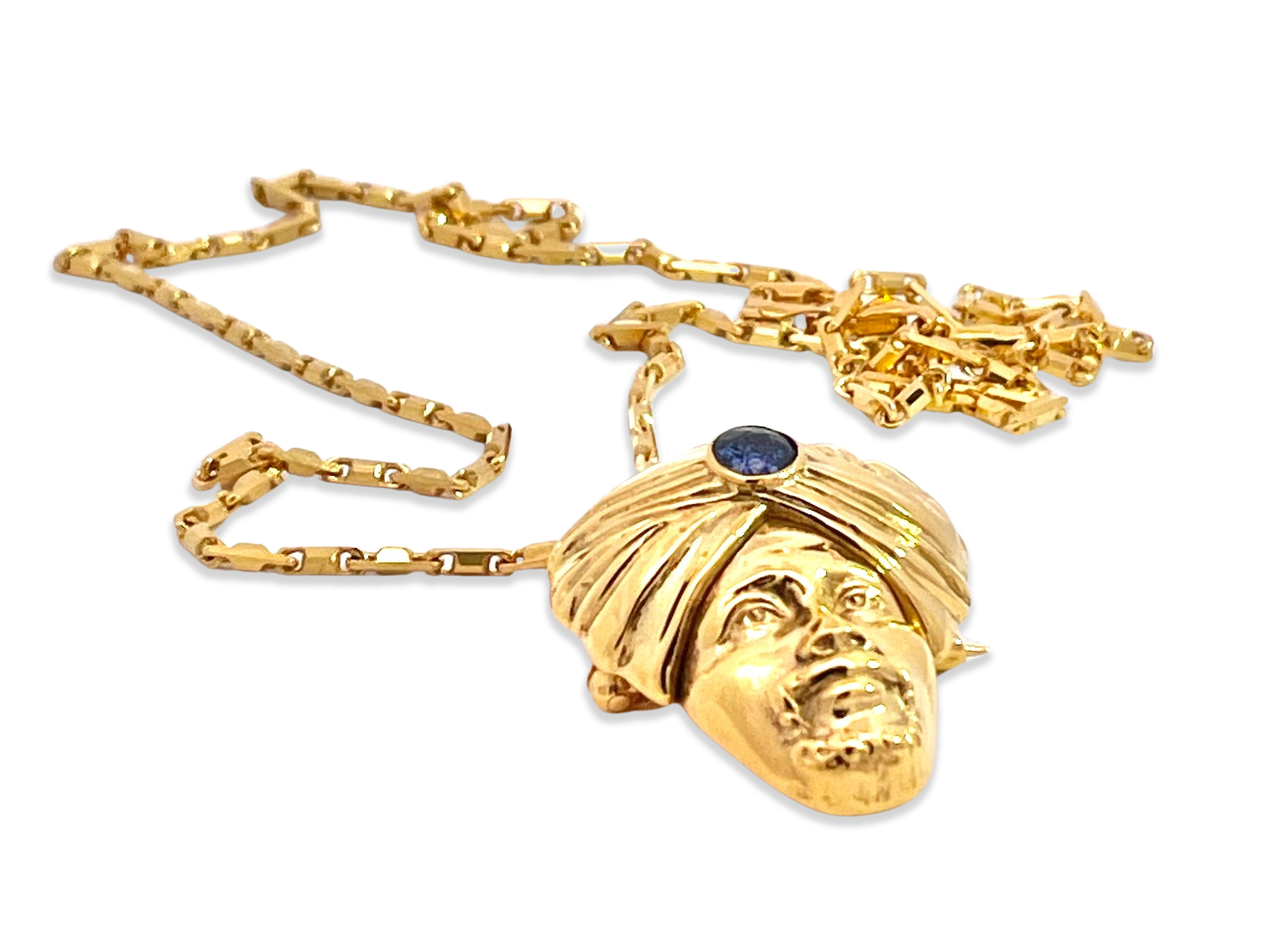 Gold genie necklace with sapphire