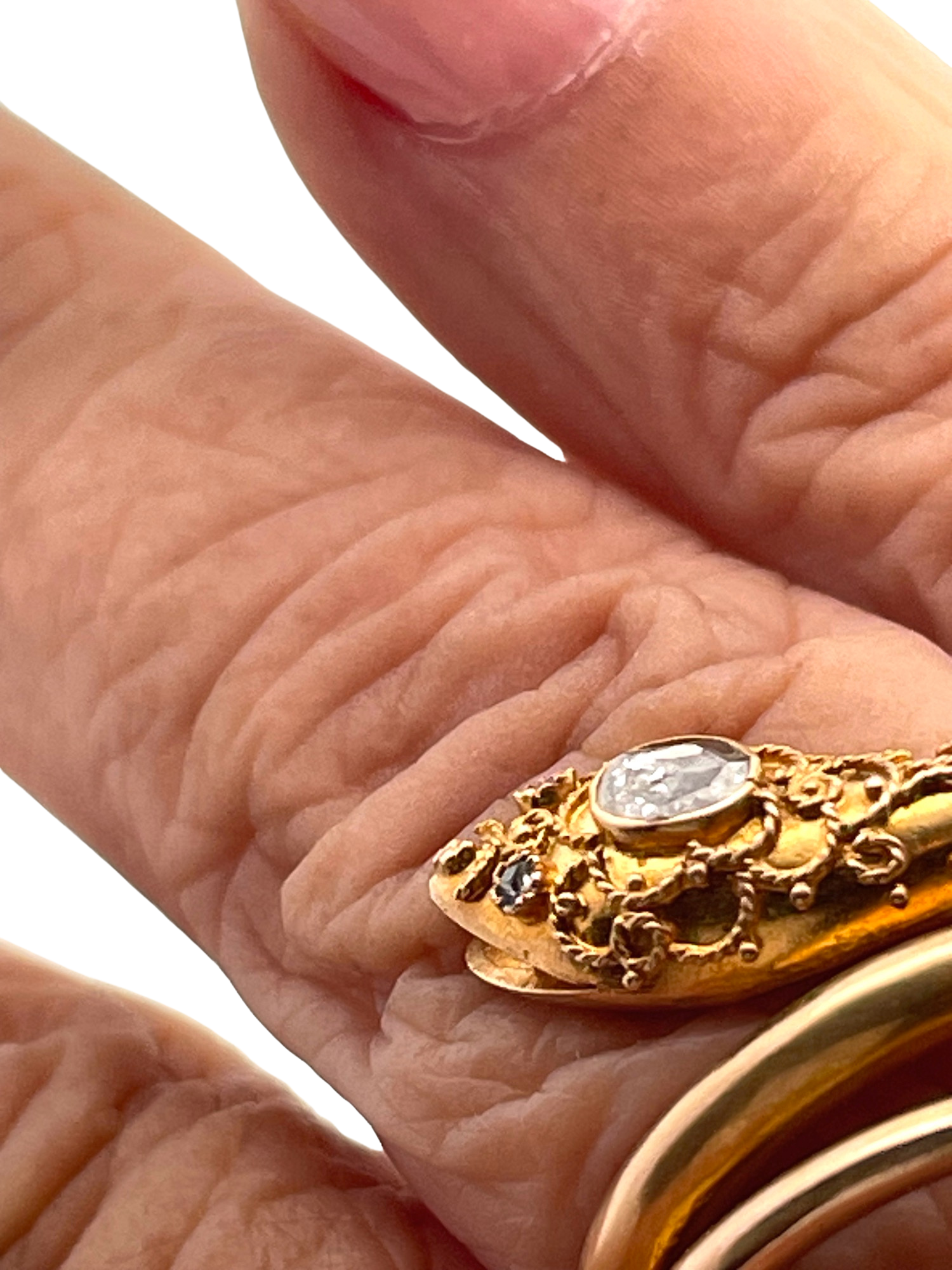 Gold snake ring with diamonds
