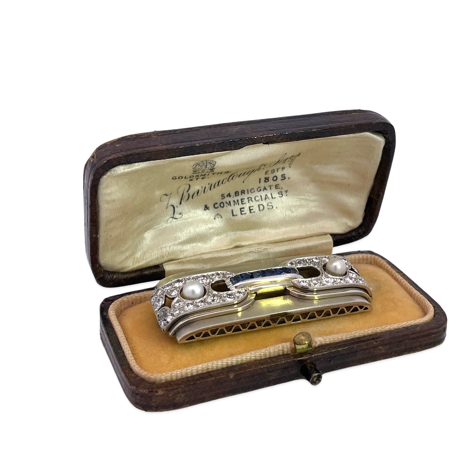 Rectangular brooch with gemstones