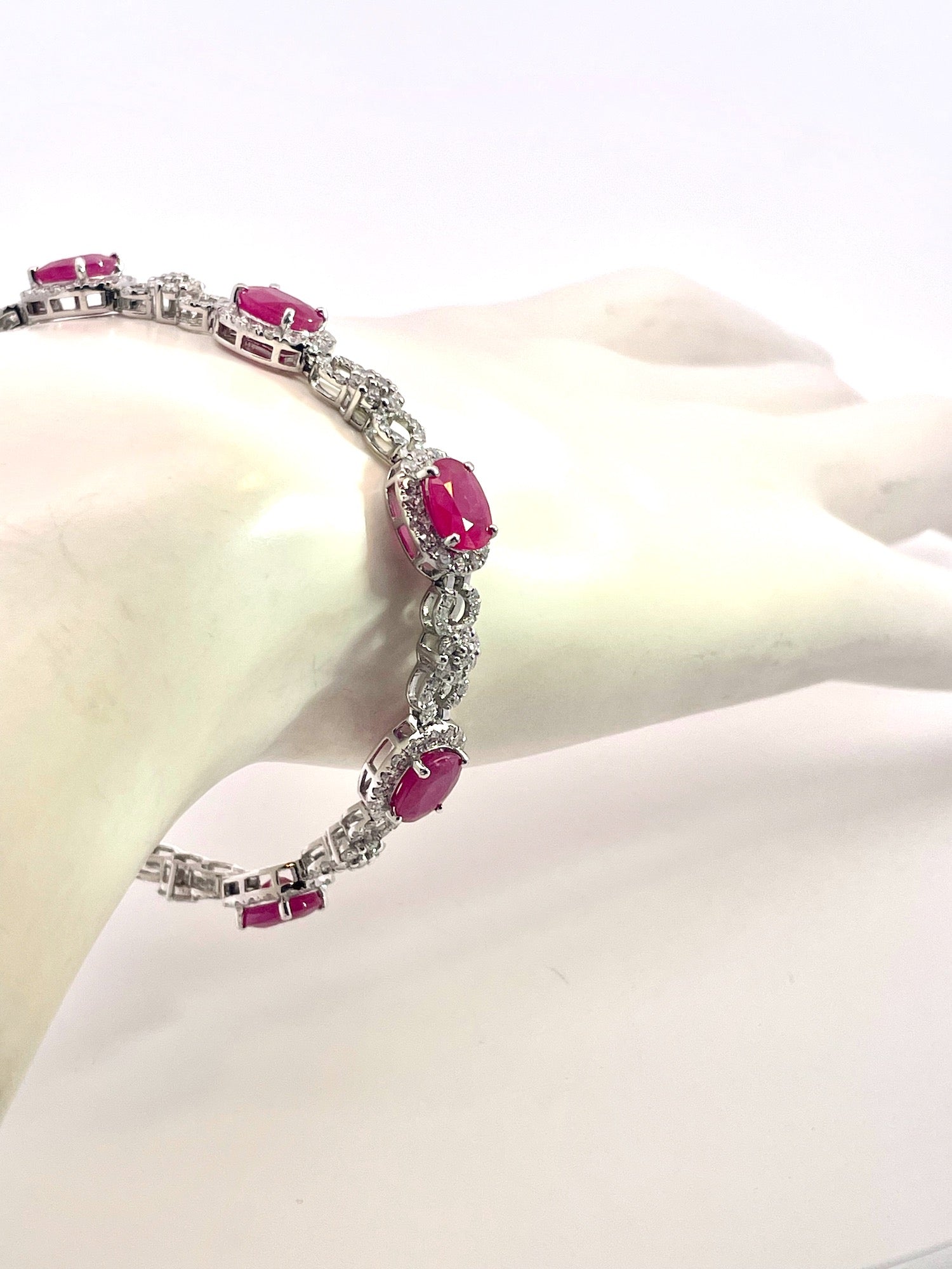Oval ruby and diamond link bracelet