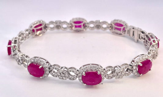 Ruby bracelet with diamond flowers