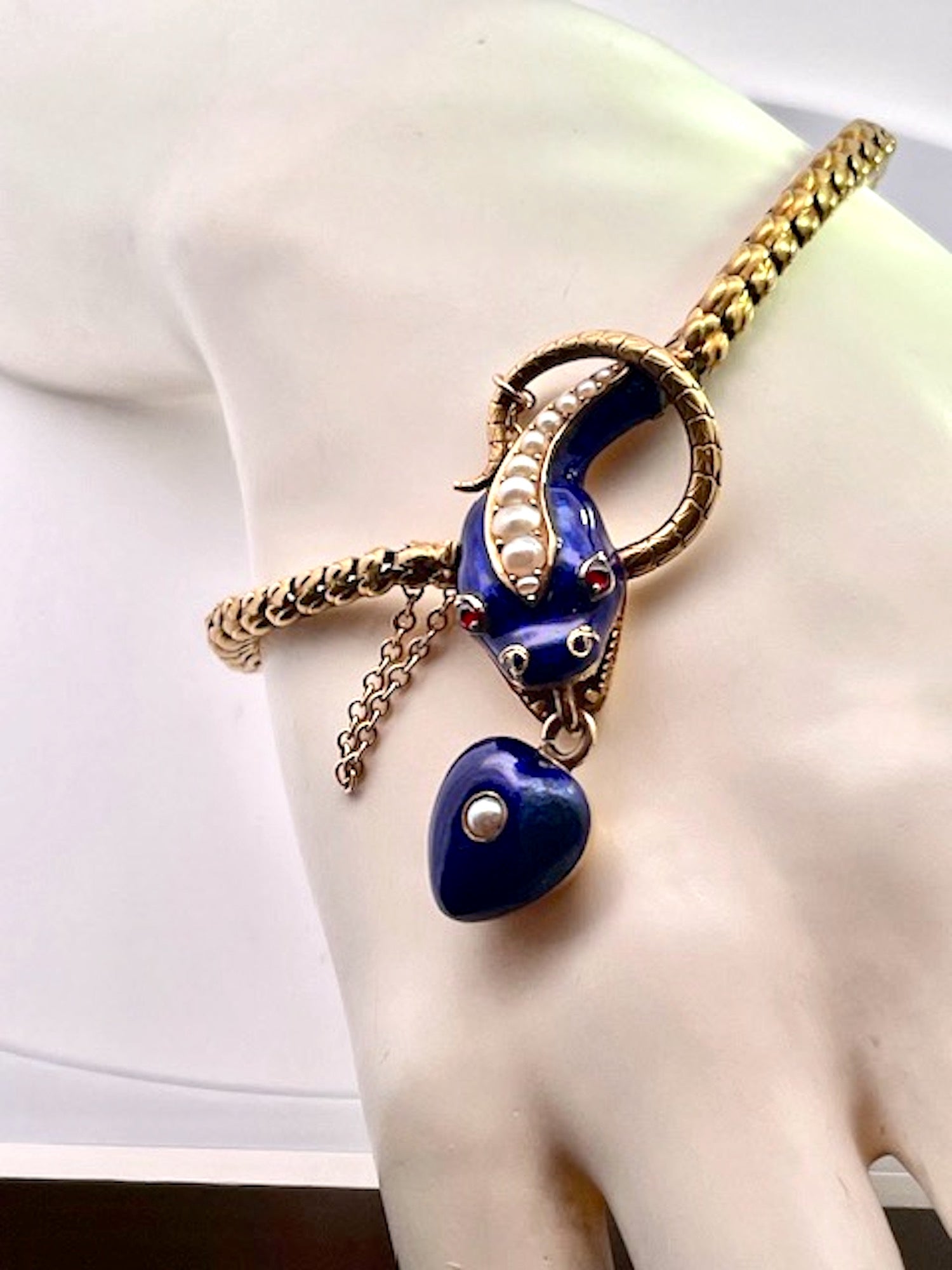 Gold Snake Bracelet with Locket and Ruby Eyes