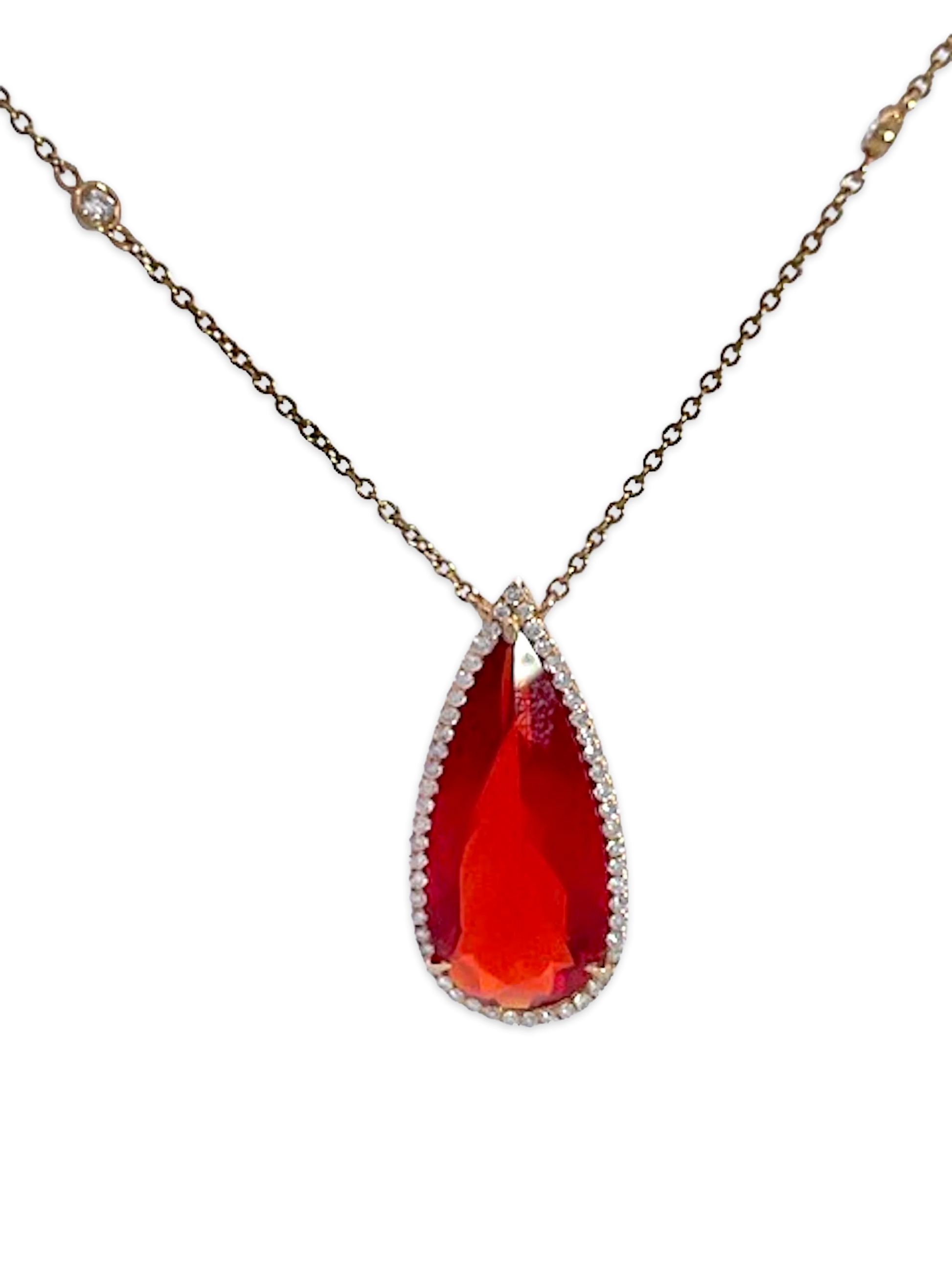 Fire Opal with Diamond surround 18K