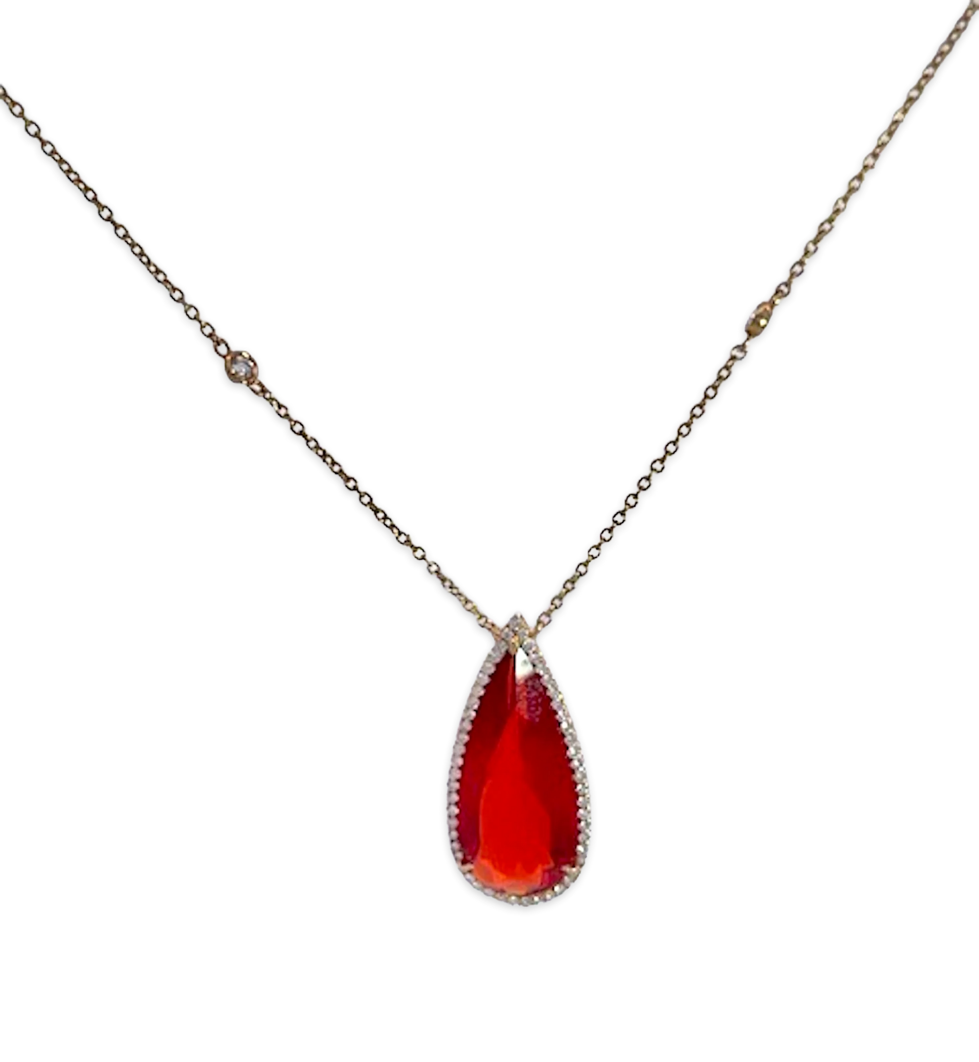 Fire Opal with Diamond surround 18K