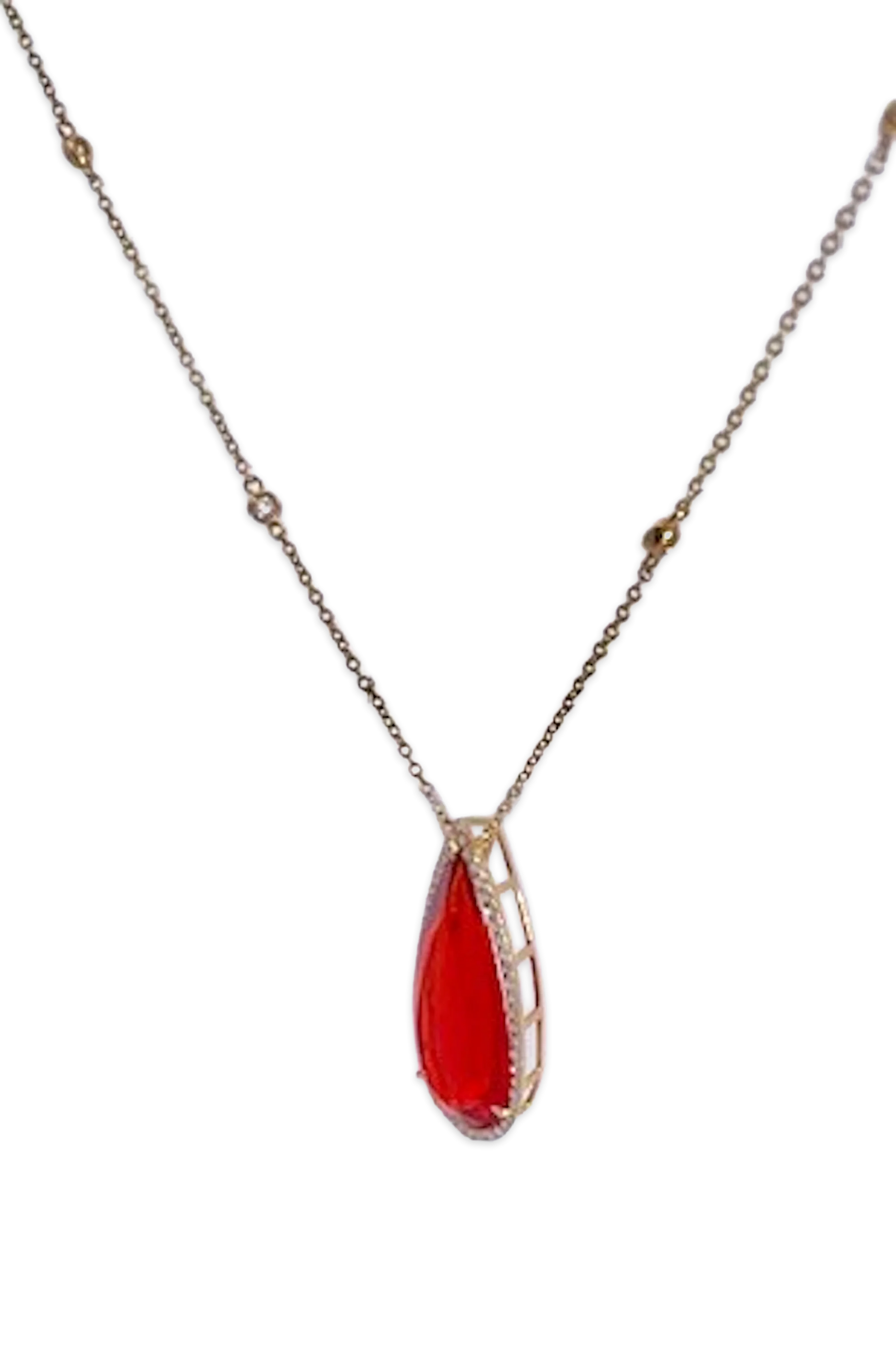 Fire Opal with Diamond surround 18K