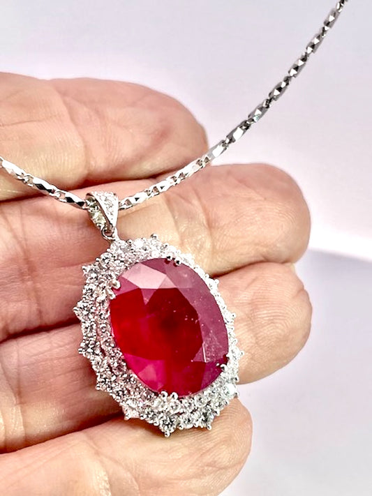 Huge Ruby Faceted  17.59 carats w/ 2.21 Diamond surround