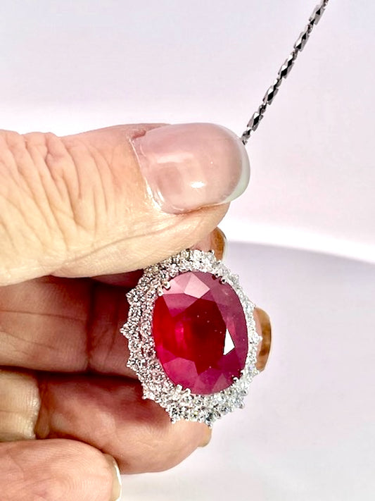 Huge Ruby Faceted  17.59 carats w/ 2.21 Diamond surround