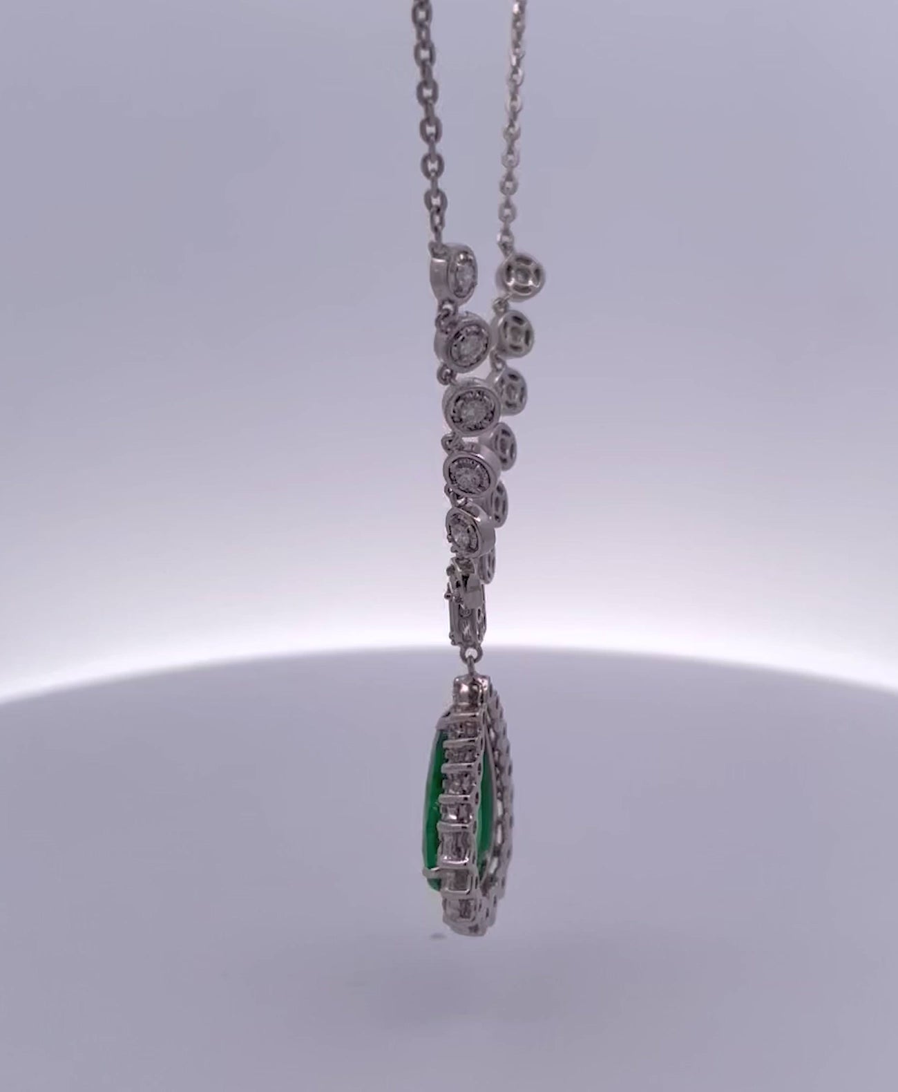 Diamond halo emerald ring video