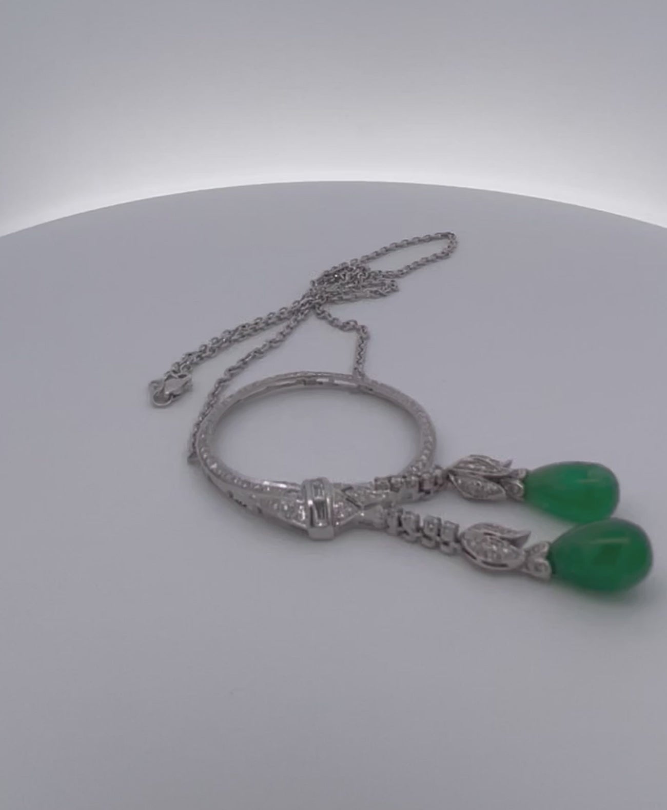 Emerald drop diamond brooch