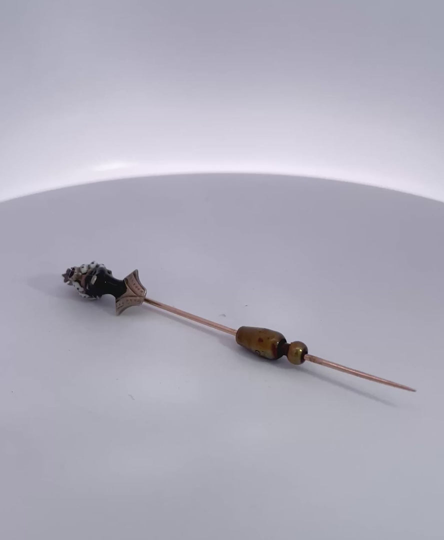 Moretto Stickpin with Coral Head and Ruby Cabochon 9K