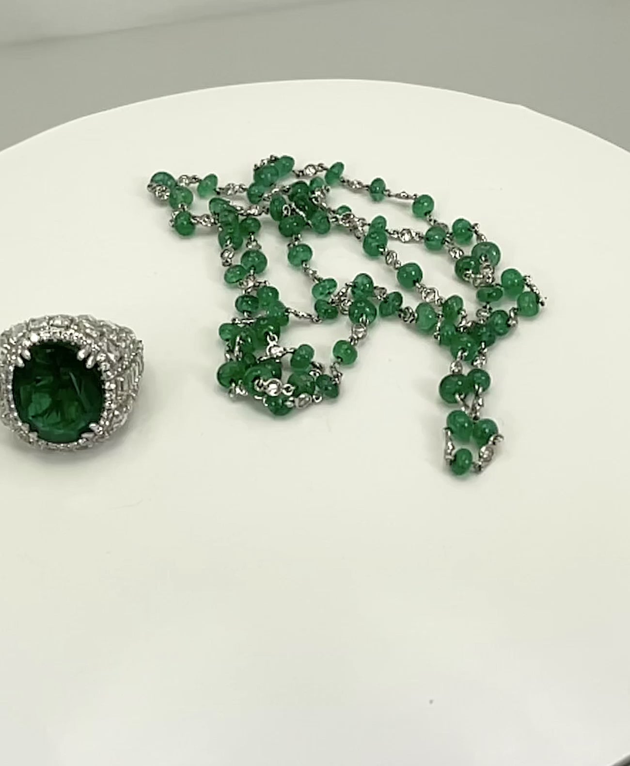 Oval Emerald 12.25 Carat Ring Diamond Surround