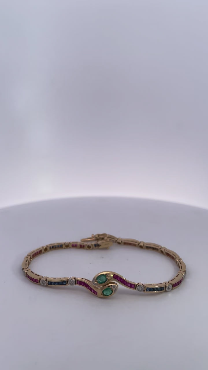 Vintage Yellow Gold Snake Bracelet with Emeralds, Rubies, and Diamonds