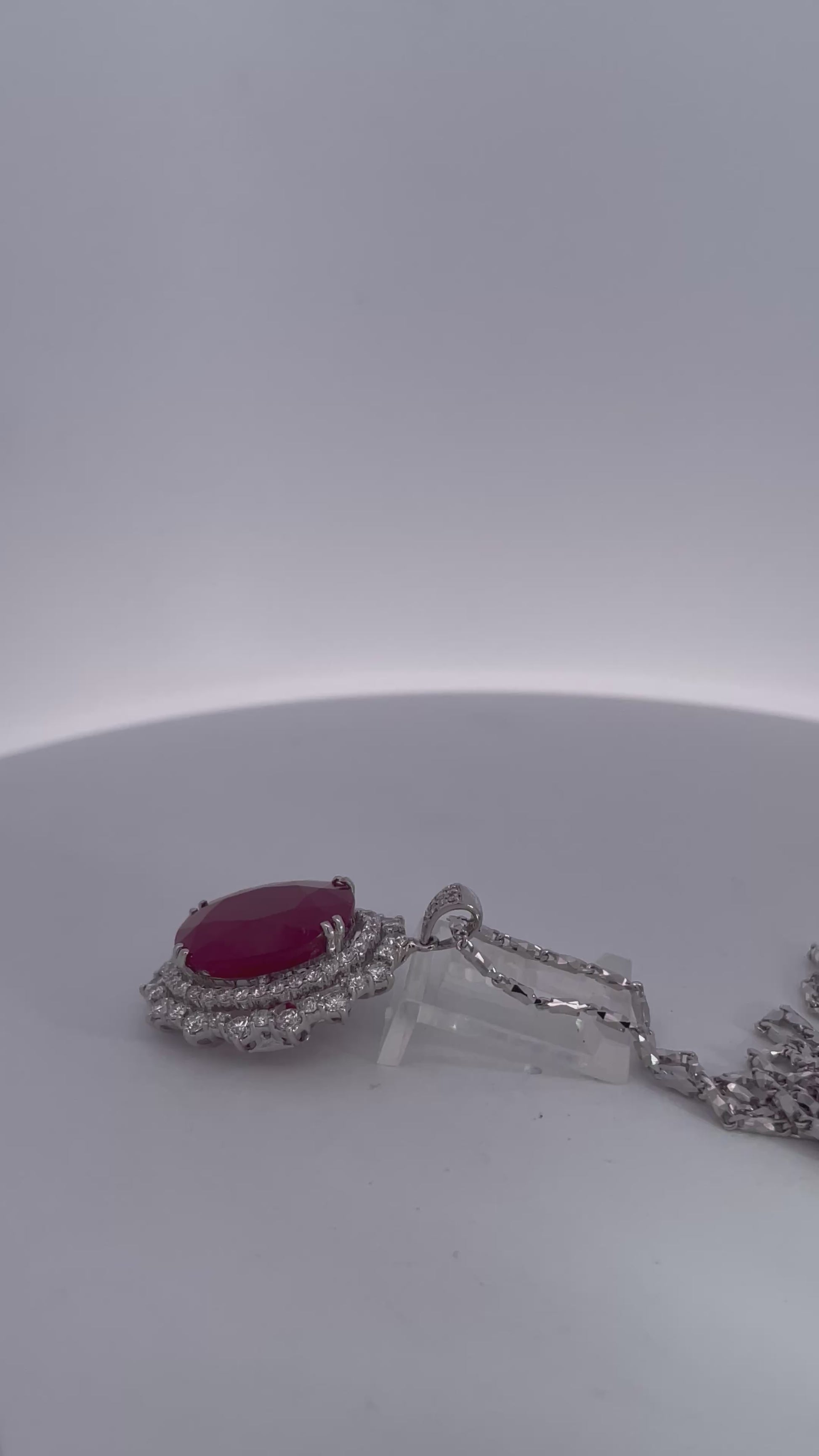 Huge Ruby Faceted  17.59 carats w/ 2.21 Diamond surround