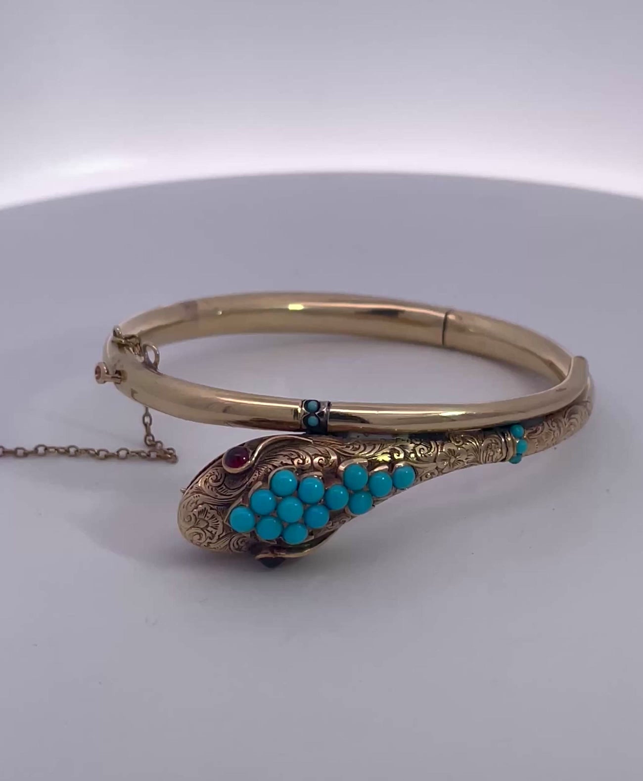 Gold Snake Bracelet with Garnet Eyes