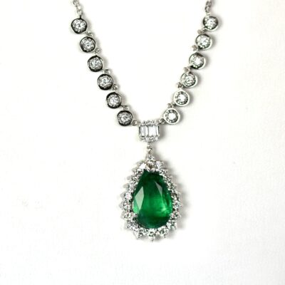 5 Carat Pear Emerald with Diamond Surround 18K