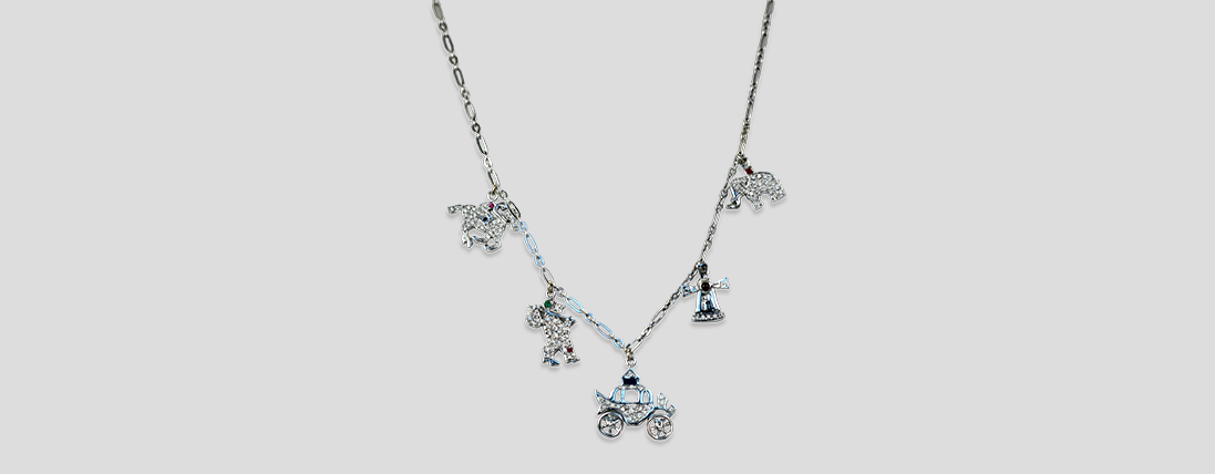 A Modern Classic Reimagined with Contemporary Elegance: The Deco Platinum Charm Necklace