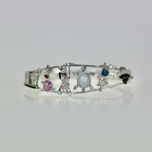 Art Deco Platinum Charms on Bracelet - Fine Estate & Vintage Jewelry | Cris Notti Jewels