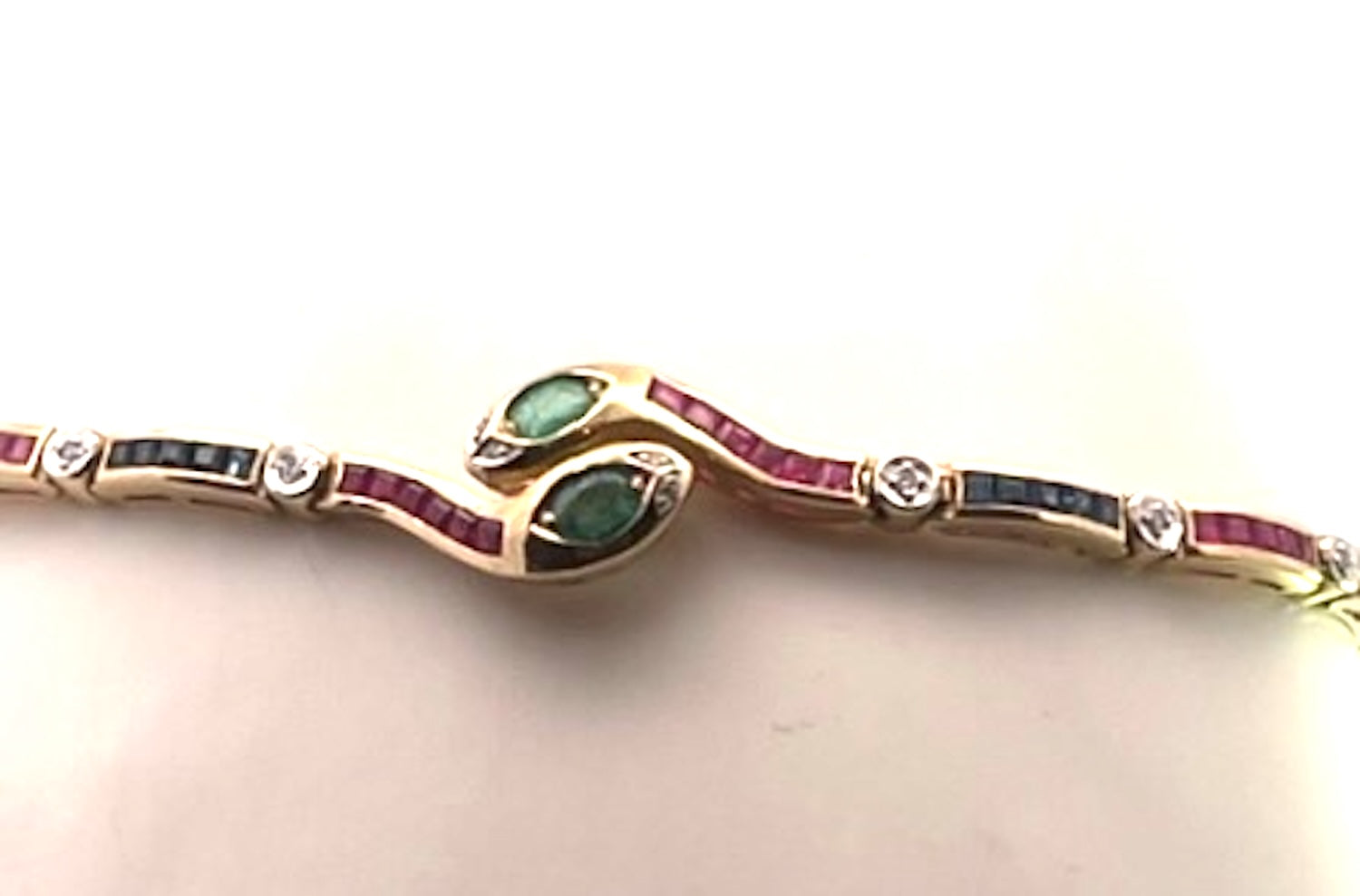Vintage Yellow Gold Snake Bracelet with Emeralds, Rubies, and Diamonds - Detail View 5 | Cris Notti Jewels