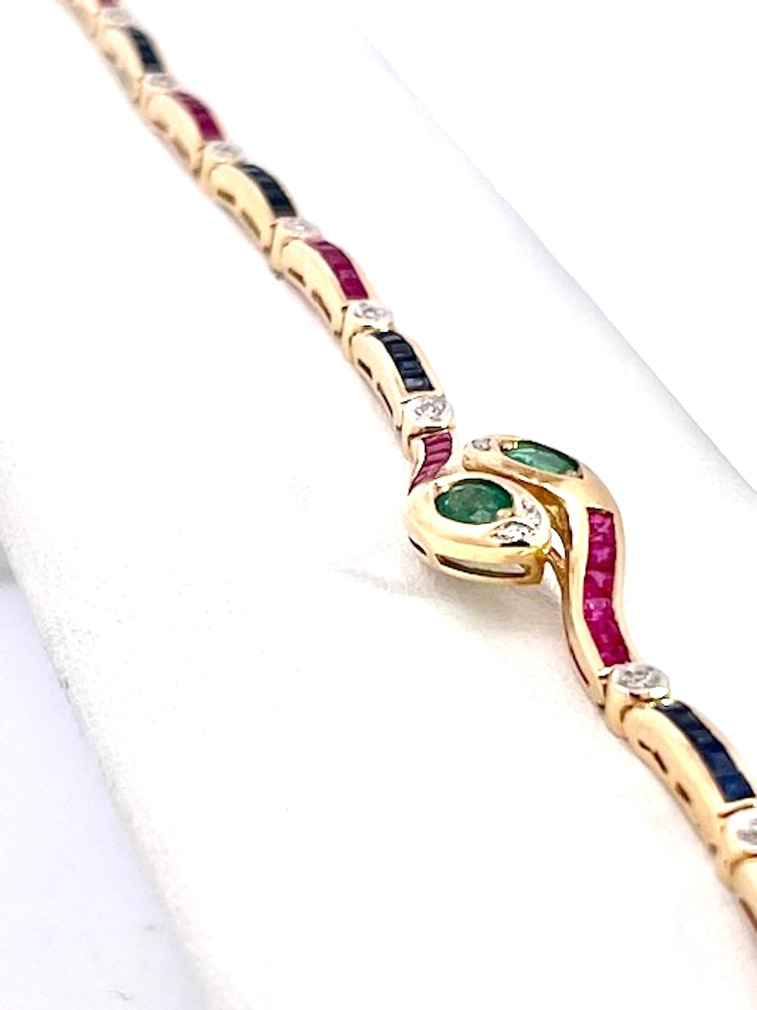 Vintage Yellow Gold Snake Bracelet with Emeralds, Rubies, and Diamonds - Detail View 4 | Cris Notti Jewels