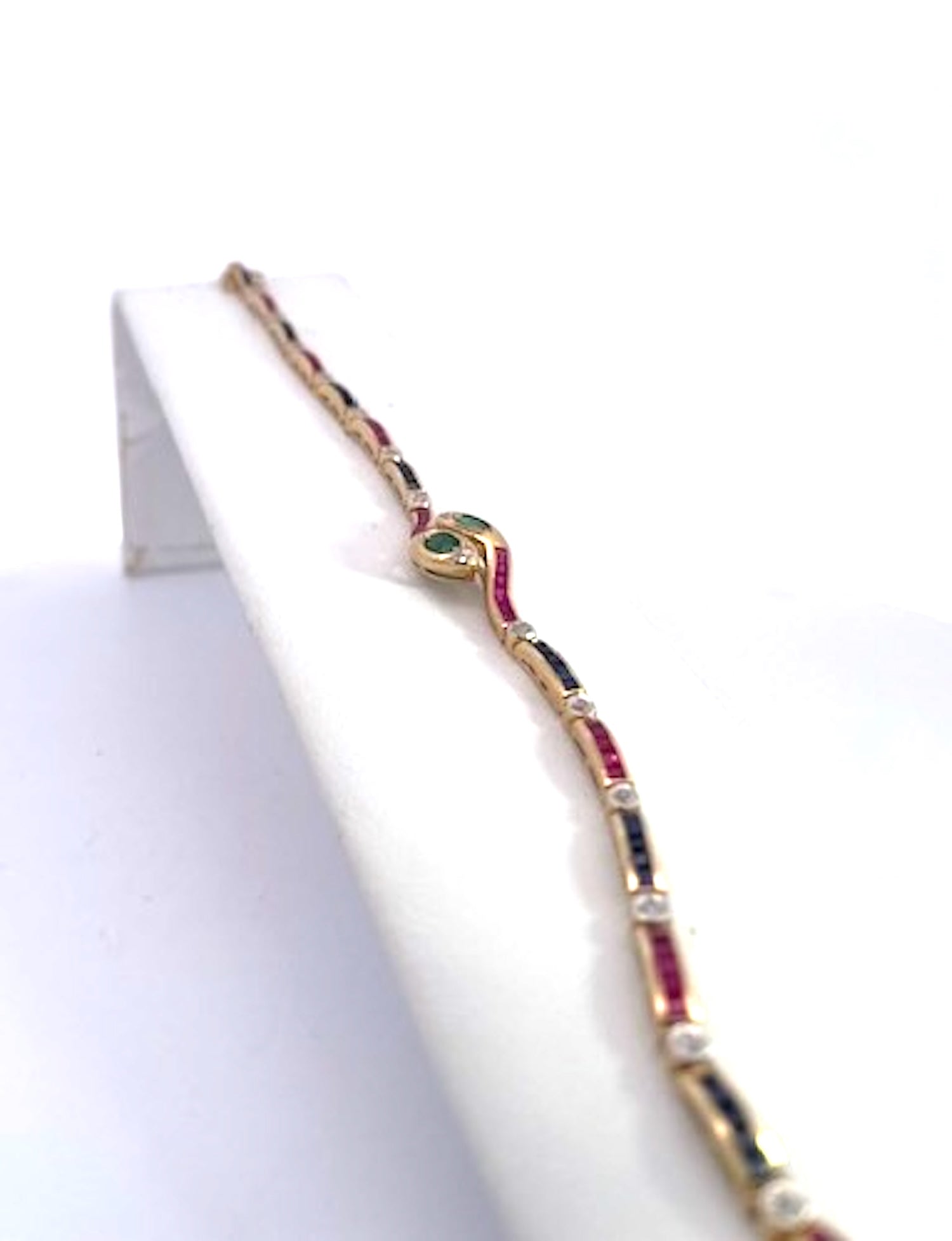 Vintage Yellow Gold Snake Bracelet with Emeralds, Rubies, and Diamonds - Detail View 3 | Cris Notti Jewels