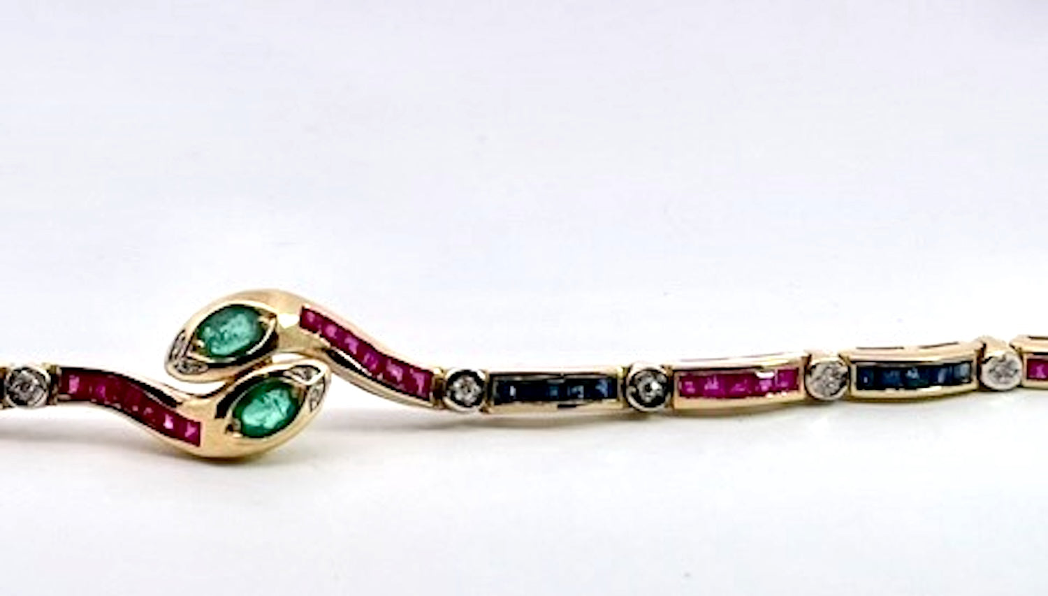 Vintage Yellow Gold Snake Bracelet with Emeralds, Rubies, and Diamonds - Detail View 2 | Cris Notti Jewels